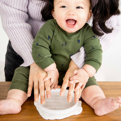 A baby with the keepsake.